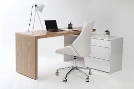 "Modern office desk and ergonomic chair for a comfortable and productive workspace"